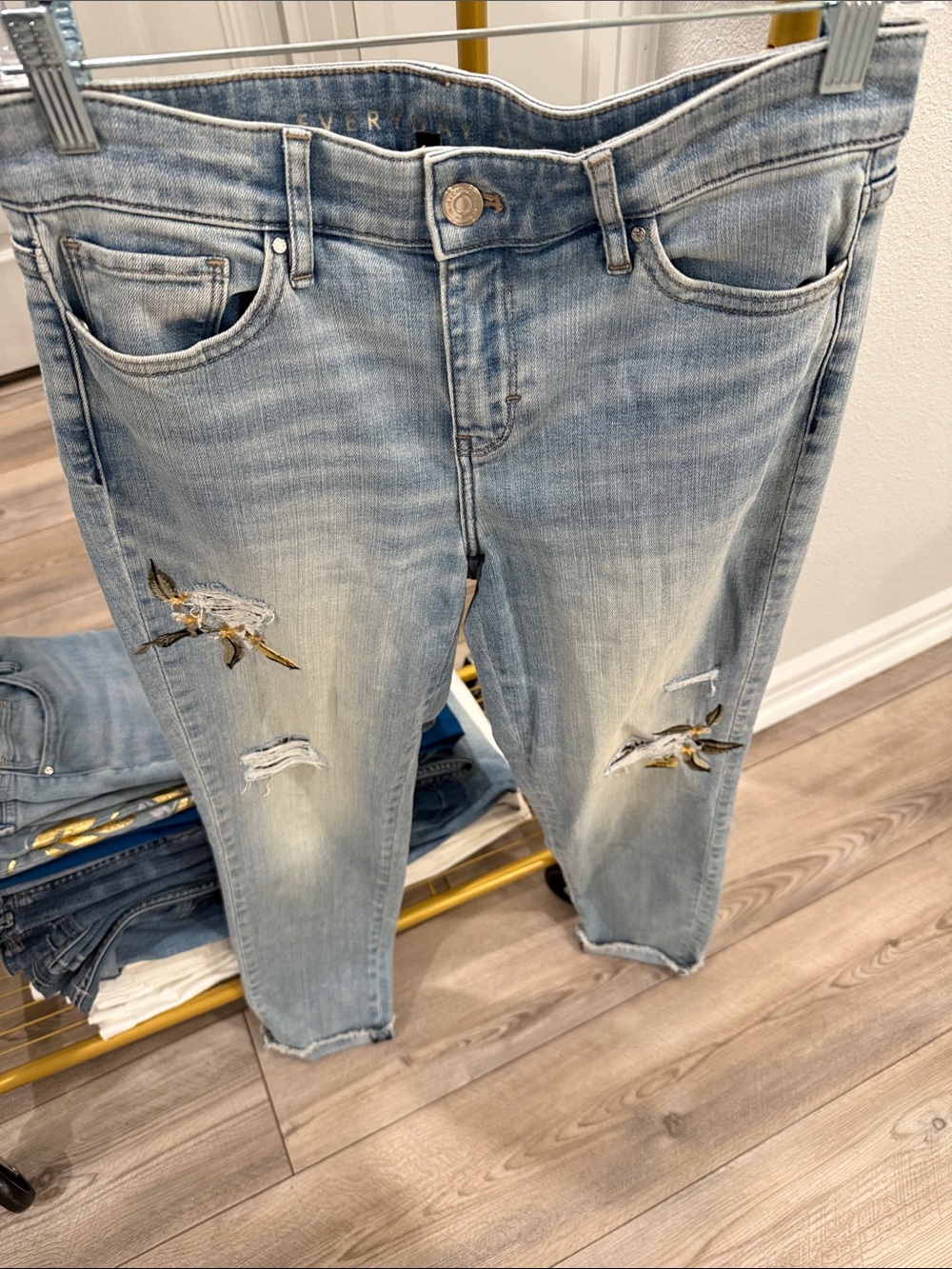 Light Wash Distressed Women’s Jeans with Embroidered Detail